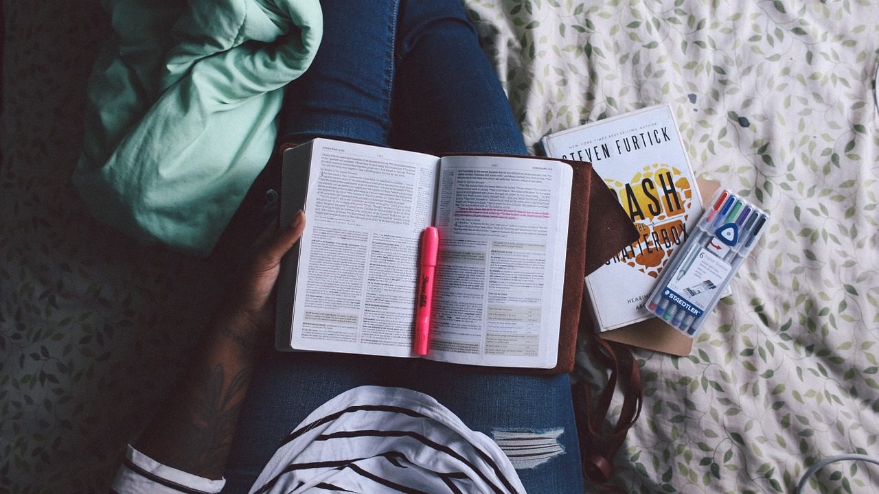 Student reading the Bible
